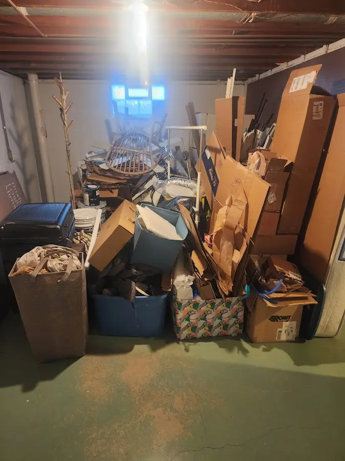 Roll-off dumpster container at job site for 6 Yard Dumpster Rental in Hobe Sound